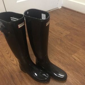 Brand new size 8 black tall Hunter boots